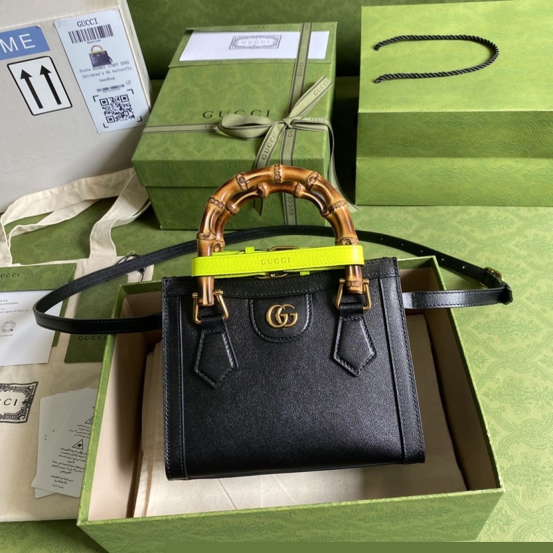 G*u*i top handle bags